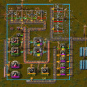 A zoomed out view of a small factory from Factorio
